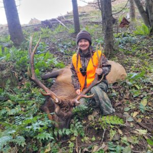Proud woman with her first elk harvest